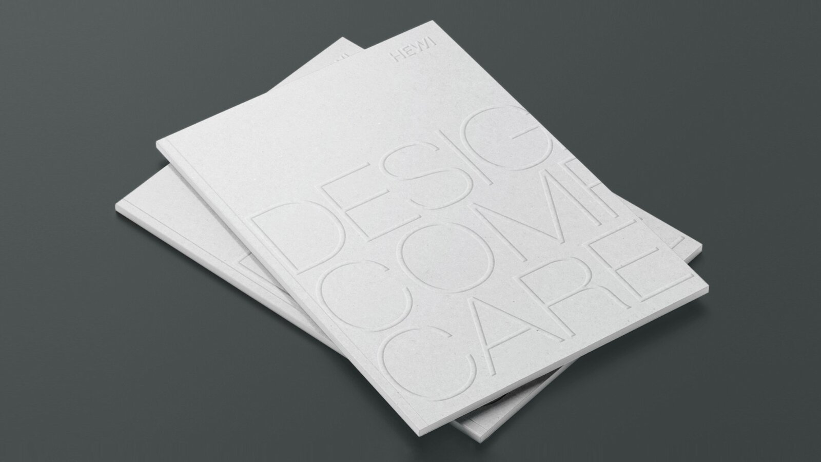 Two stacked Design Comfort Care brochures